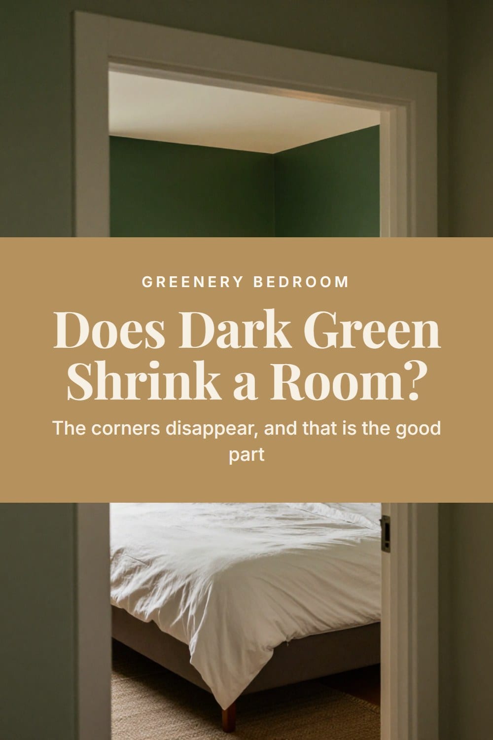 Doorway view into a deep forest green bedroom where the corners fade into shadow beside a lit bedside lamp