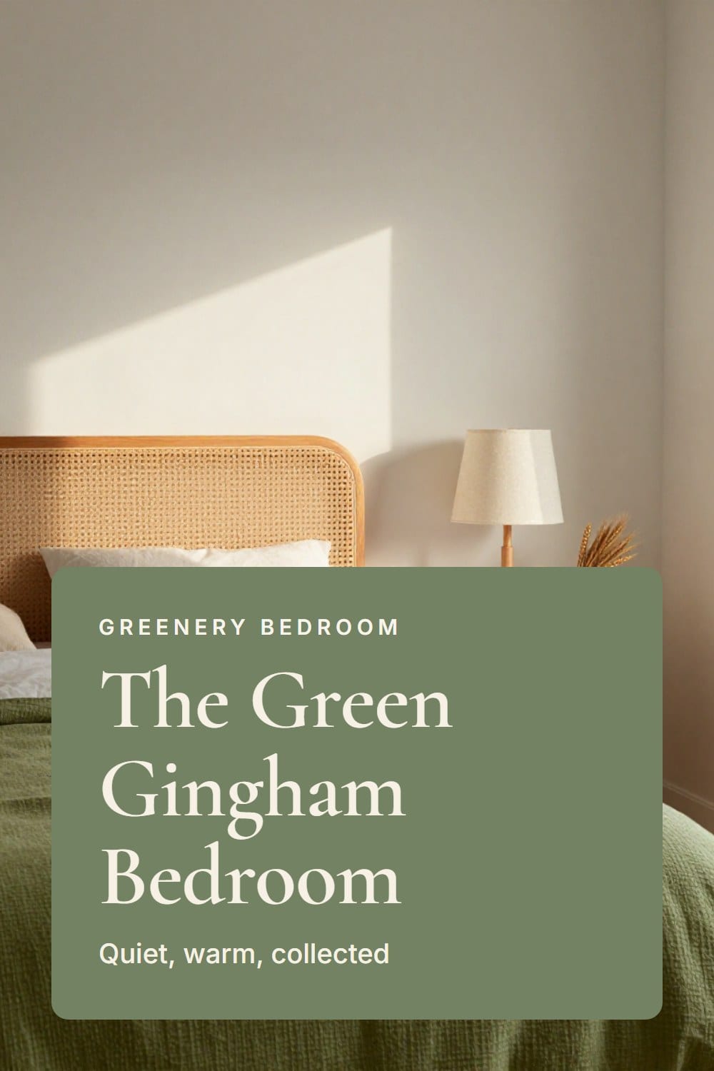 Bedroom with a moss gingham duvet, cane headboard, rattan bedside table and linen shade lamp in golden morning light