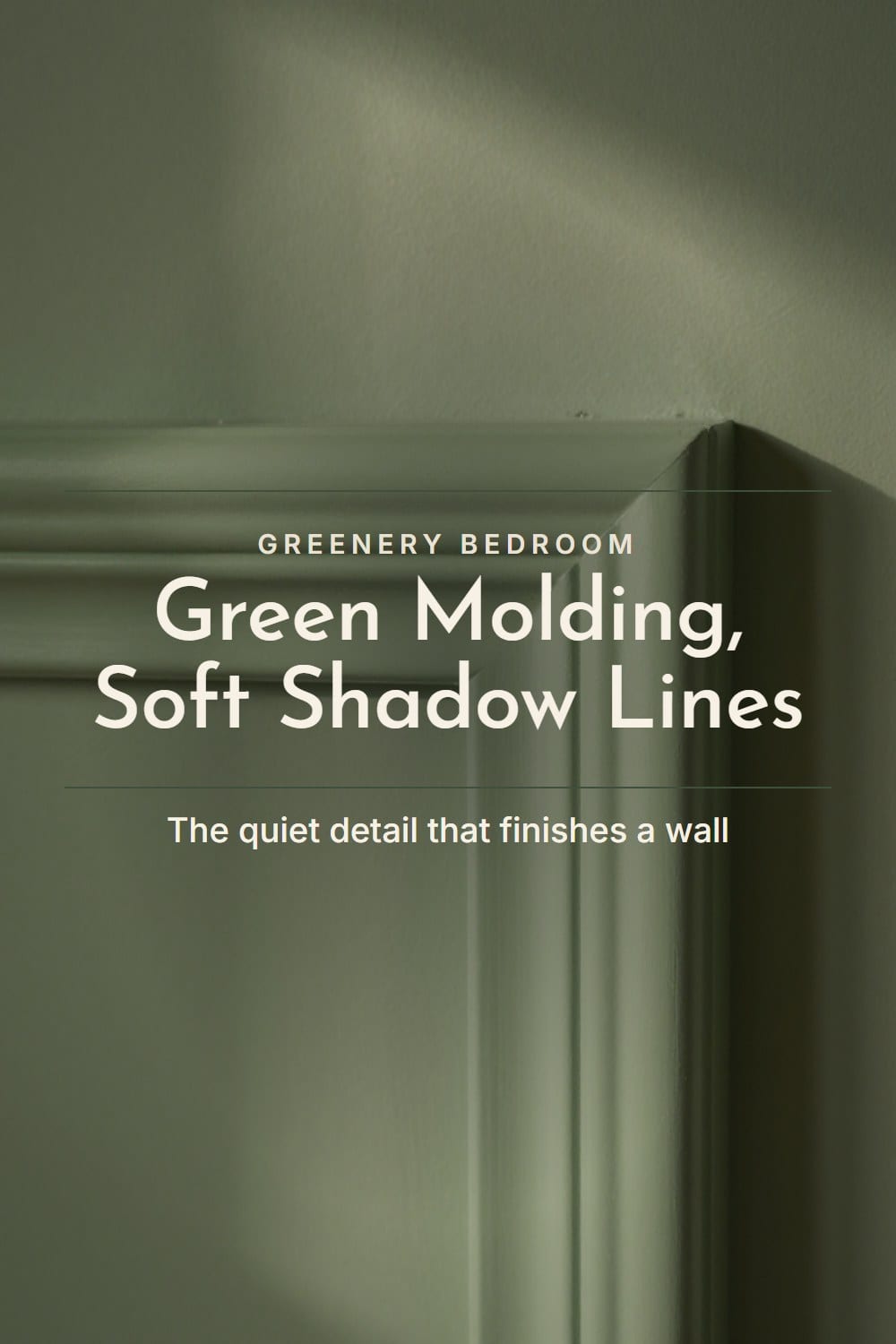 Macro of a mitered corner of green painted picture-frame molding with a soft shadow line on the wall