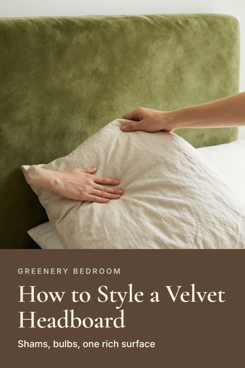 Hands setting an oatmeal linen Euro sham against a green velvet headboard over white percale