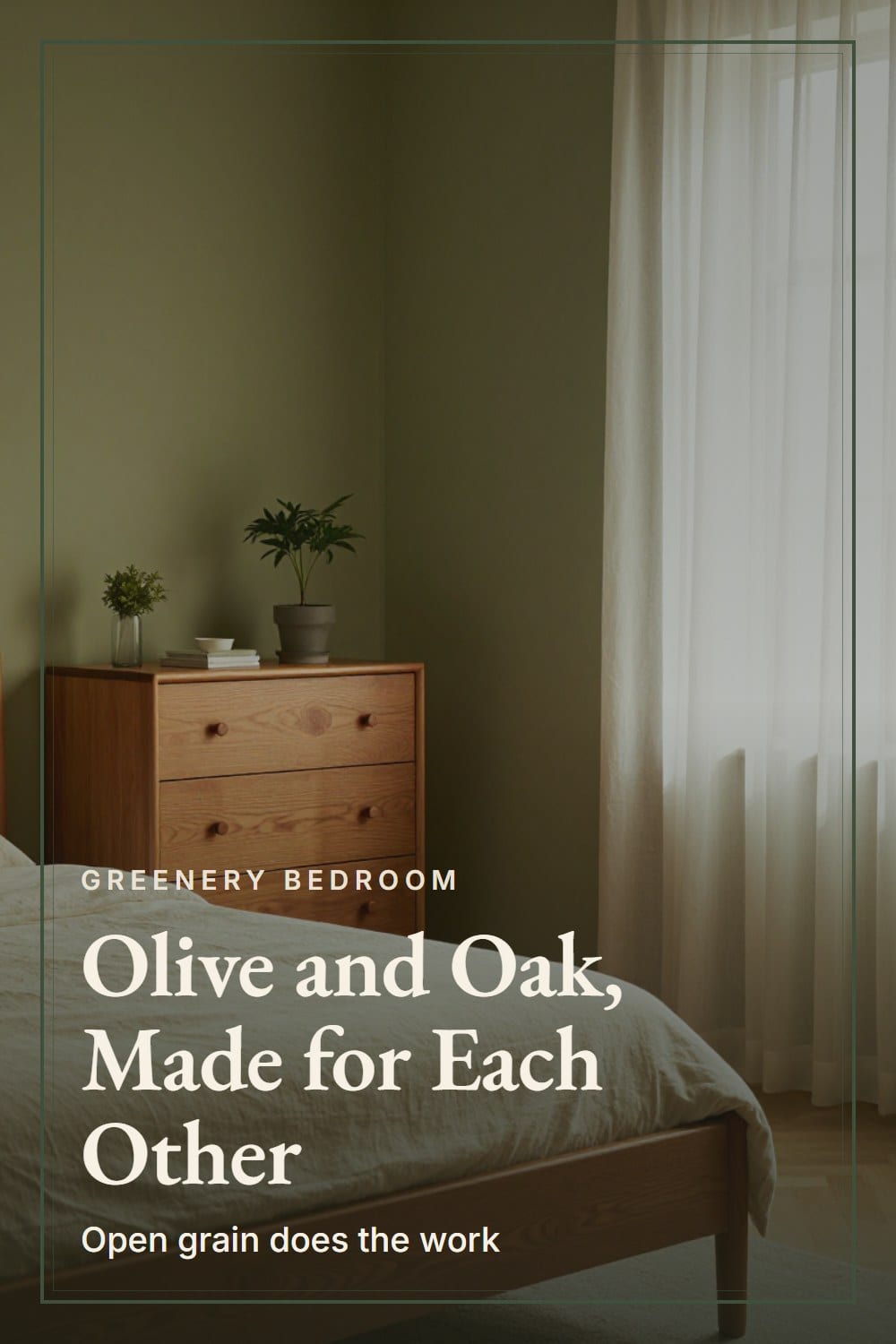 Olive green bedroom with a honey oak dresser and oak bed frame in morning light through sheer linen curtains