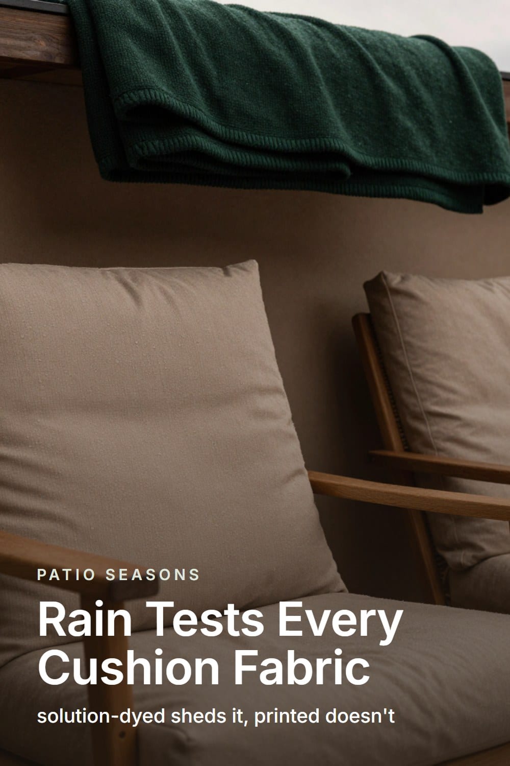 Rain beading on a solution-dyed outdoor cushion while a folded wool throw stays dry nearby
