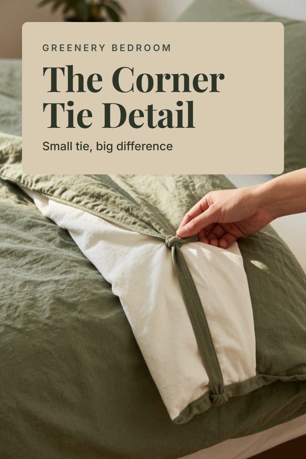 A hand knotting the inside corner tie of an olive linen duvet cover to the corner of the insert