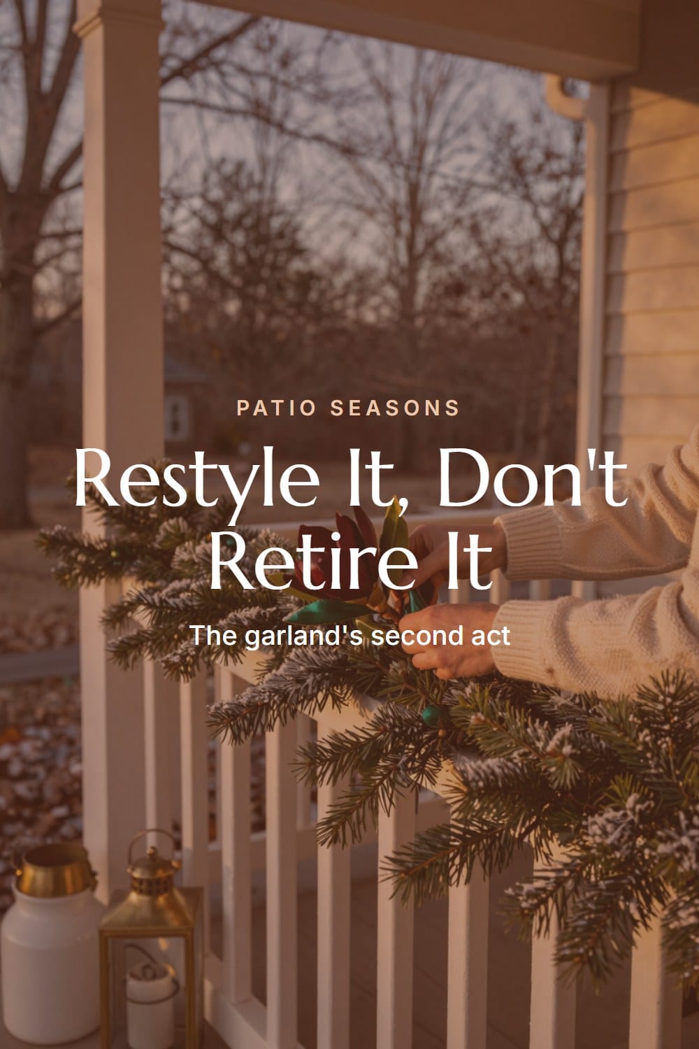 Hands-in-frame styling moment restyling a porch garland with magnolia