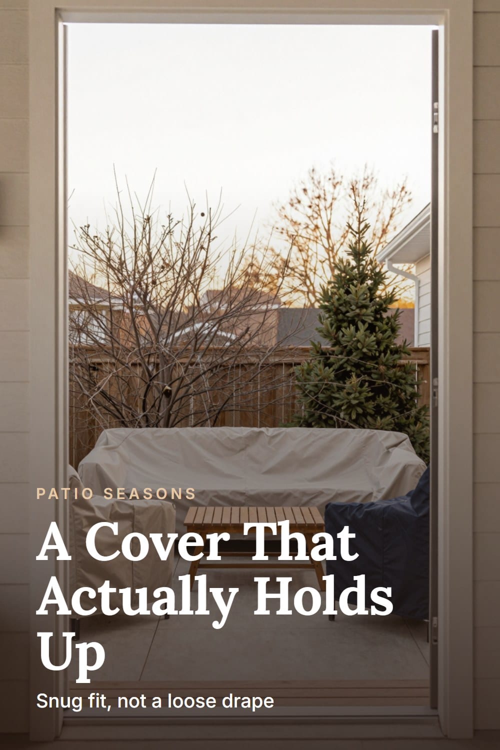 Doorway view of a covered patio set seen from just outside the threshold in cold morning light