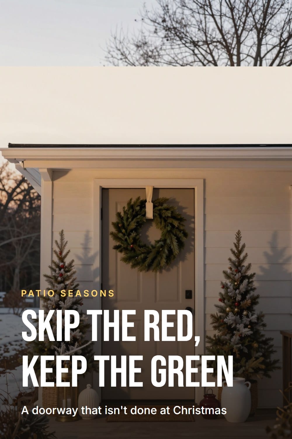 Doorway framing of a front door with a neutral evergreen swag instead of a red-ribboned holiday one